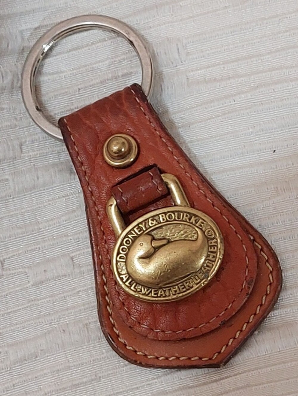 Vintage Dooney & Bourke Chestnut Brown Leather Keychain with Brass Medallion